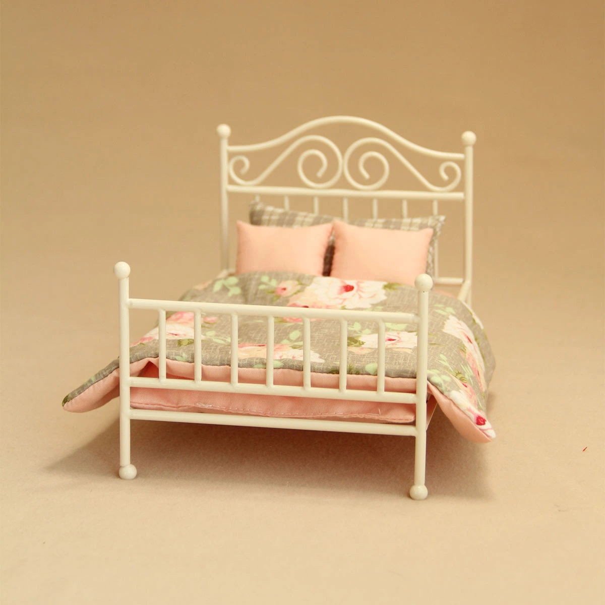 miniature bed with floral bedings
